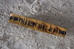 spilla,1961.oro-niello-rubino